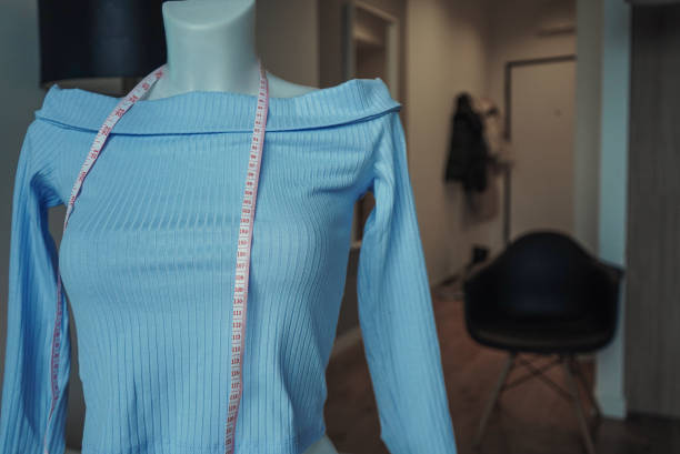 Mannequin and measuring tape. sewing at home. startup sewing clothes.