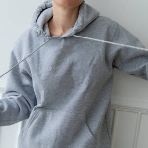 Cool girl wearing a gray hoodie