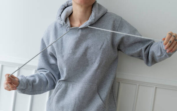 Cool girl wearing a gray hoodie